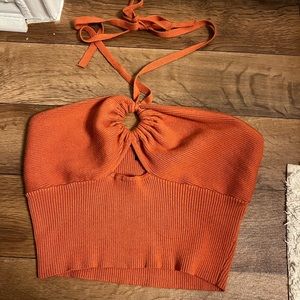 Burnt orange crop top, size large but fits like small!
